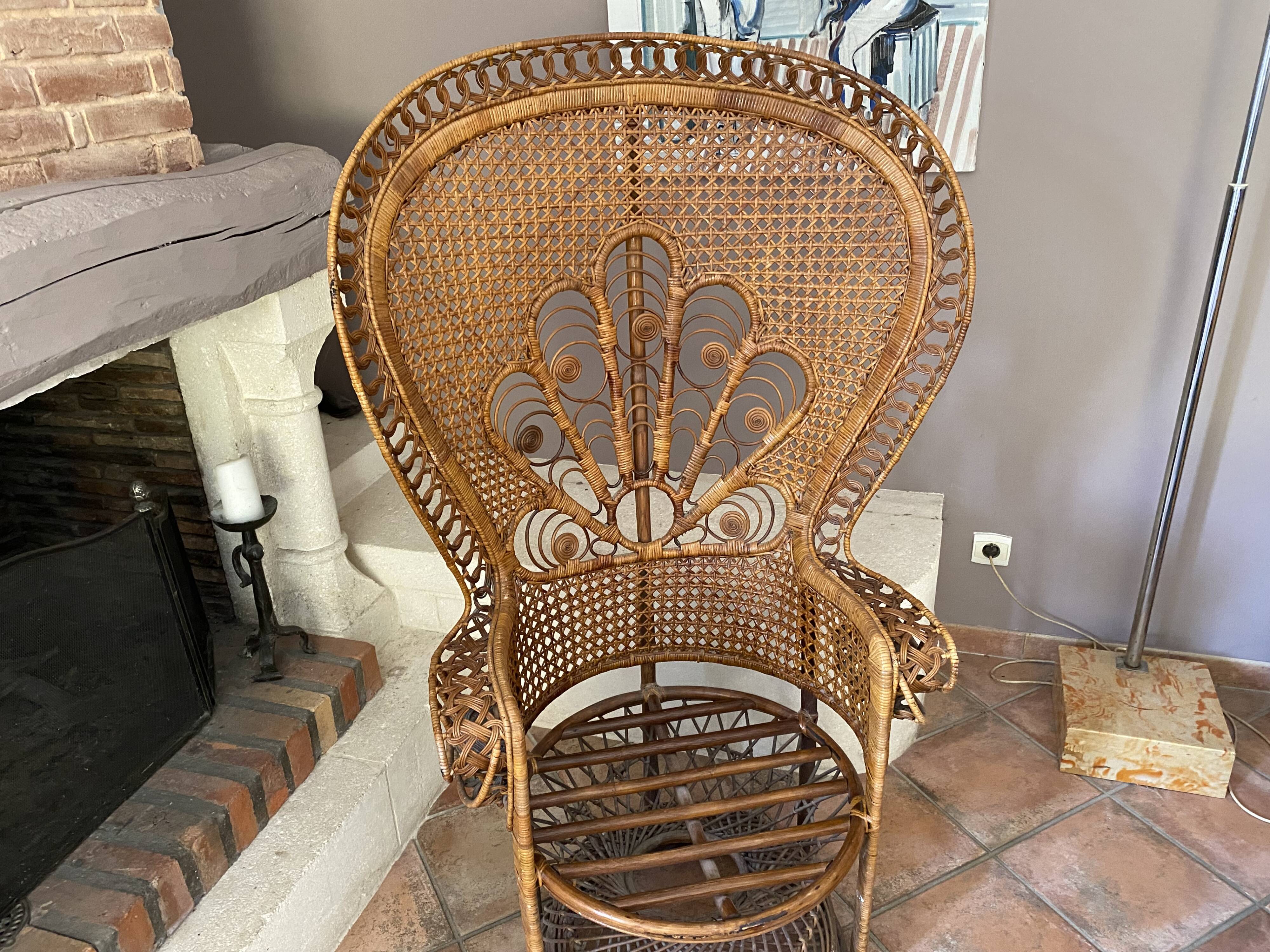 Large Emmanuelle rattan armchair. 1970.