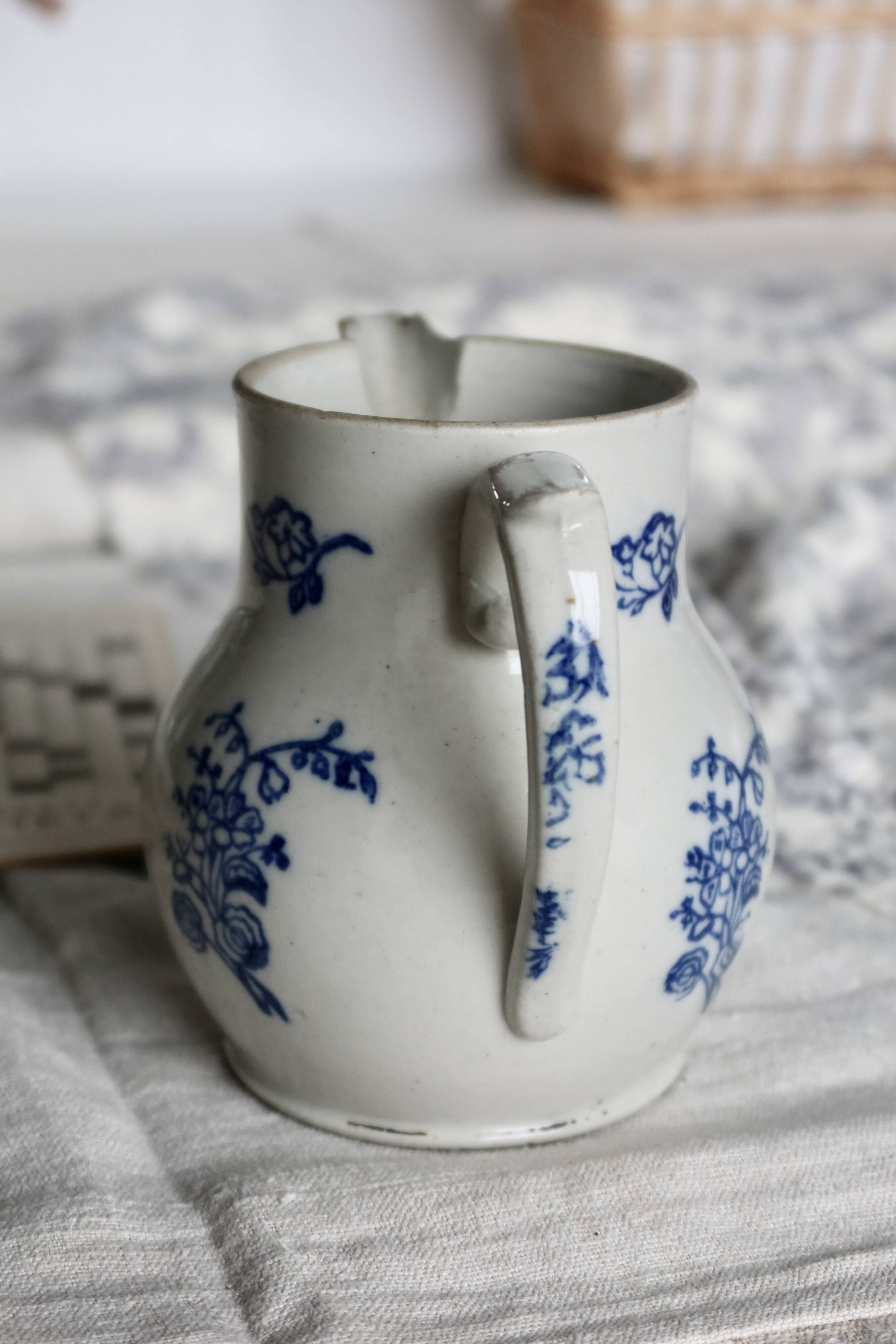 Antique Saint-Uze steel clay pitcher with cobalt blue floral pattern