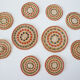 Set of coasters and bottles in colored wicker
