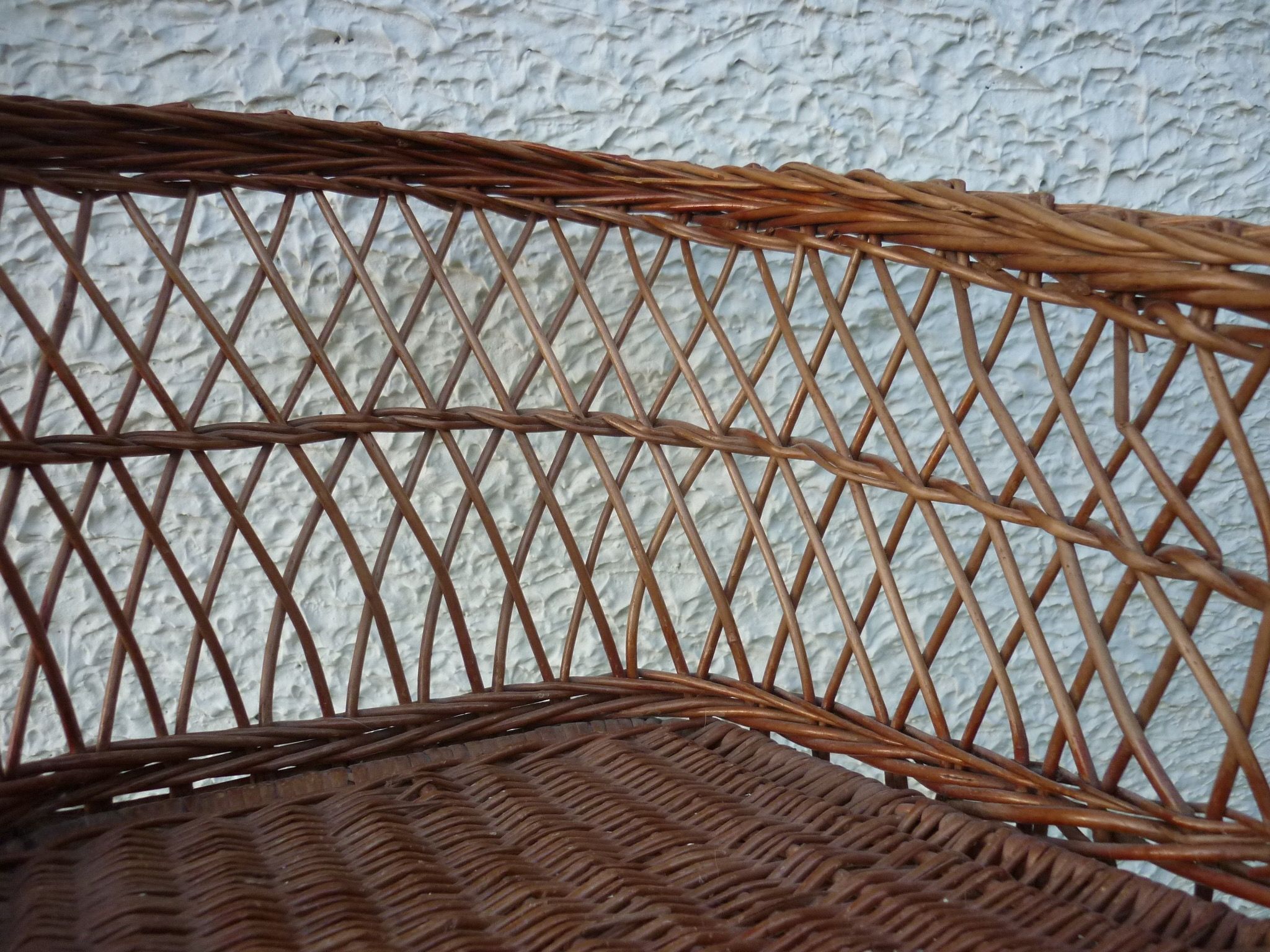 Children's basket chair in vintage braided wicker