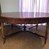Important central pedestal table in mahogany, brass and bronze that can form a large dining table.