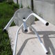 Fully adjustable white metal workshop chair in height