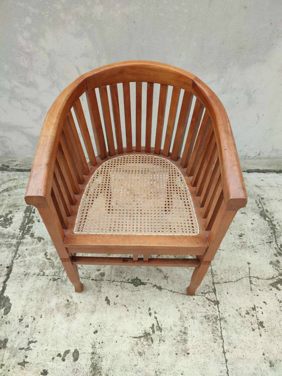 Old vintage teak wood cane armchair