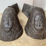Pair of modernist anthropomorphic fireplace andirons, brutalist log holders 1950s