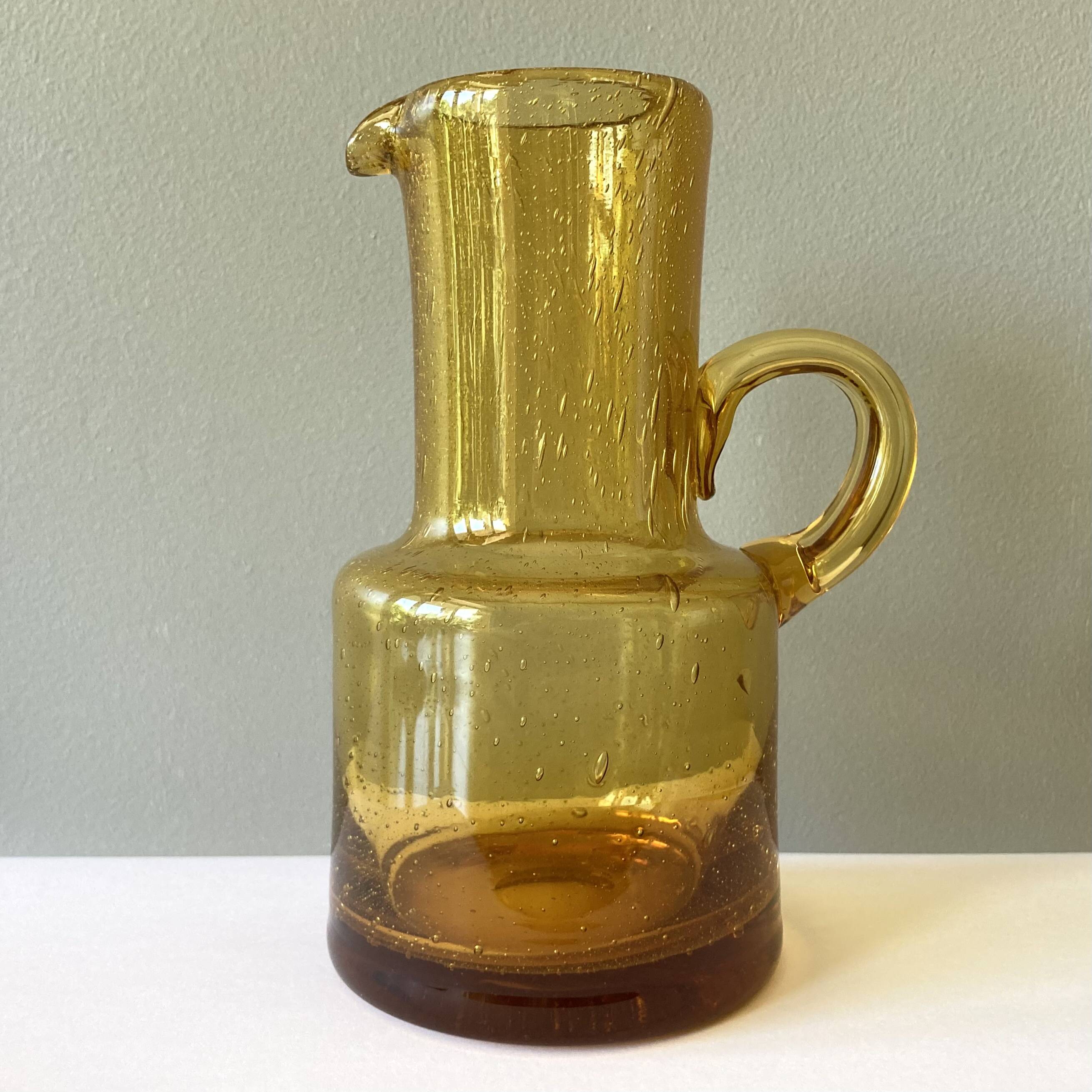 Vintage pitcher or jug forming a vase in amber and bubbled glass in the style of Biot glassware