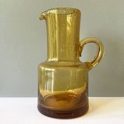 Vintage pitcher or jug forming a vase in amber and bubbled glass in the style of Biot glassware