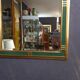 Miroir vintage vert et doré, 88x52 cm