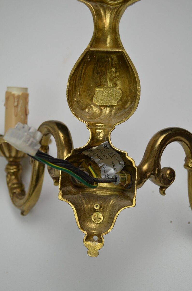 Pair of wall lamps with two lights in Louis XV style bronze
