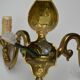 Pair of wall lamps with two lights in Louis XV style bronze