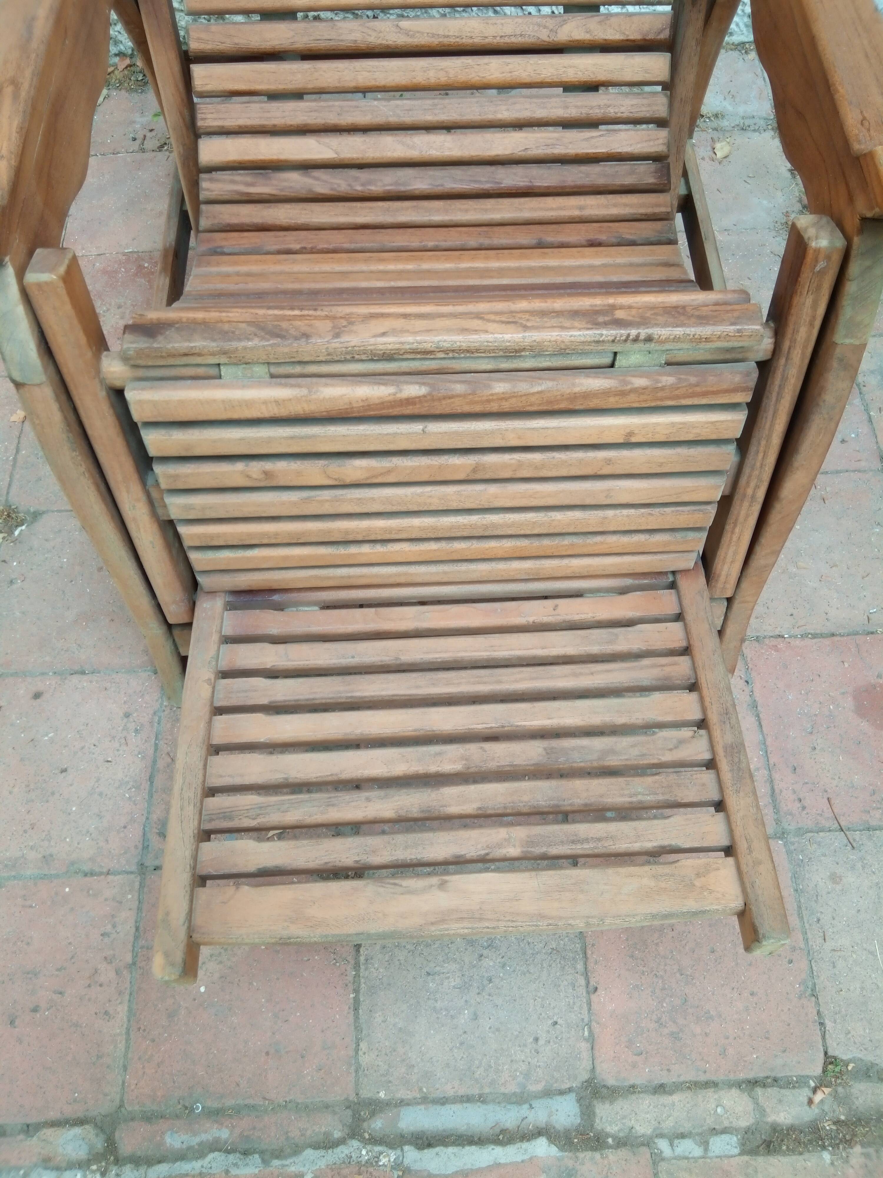 Teak stretchy long chair.