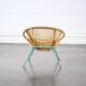 Fauteuil en rotin pieds métal vert