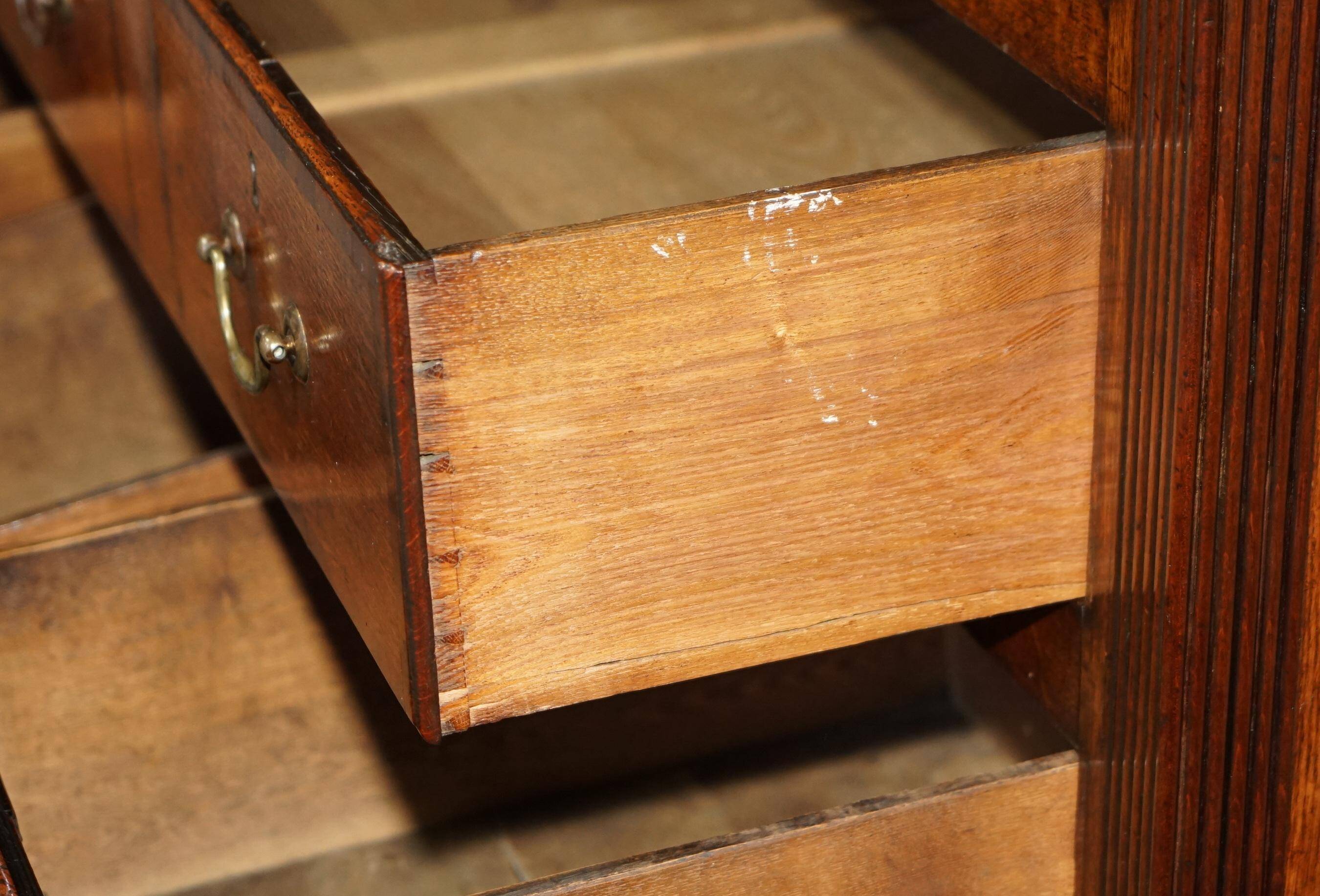 Georgian oak commode with a folding top, English, 18th century.