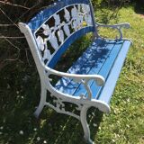 Wood garden bench and iron cast iron. Grape clusters