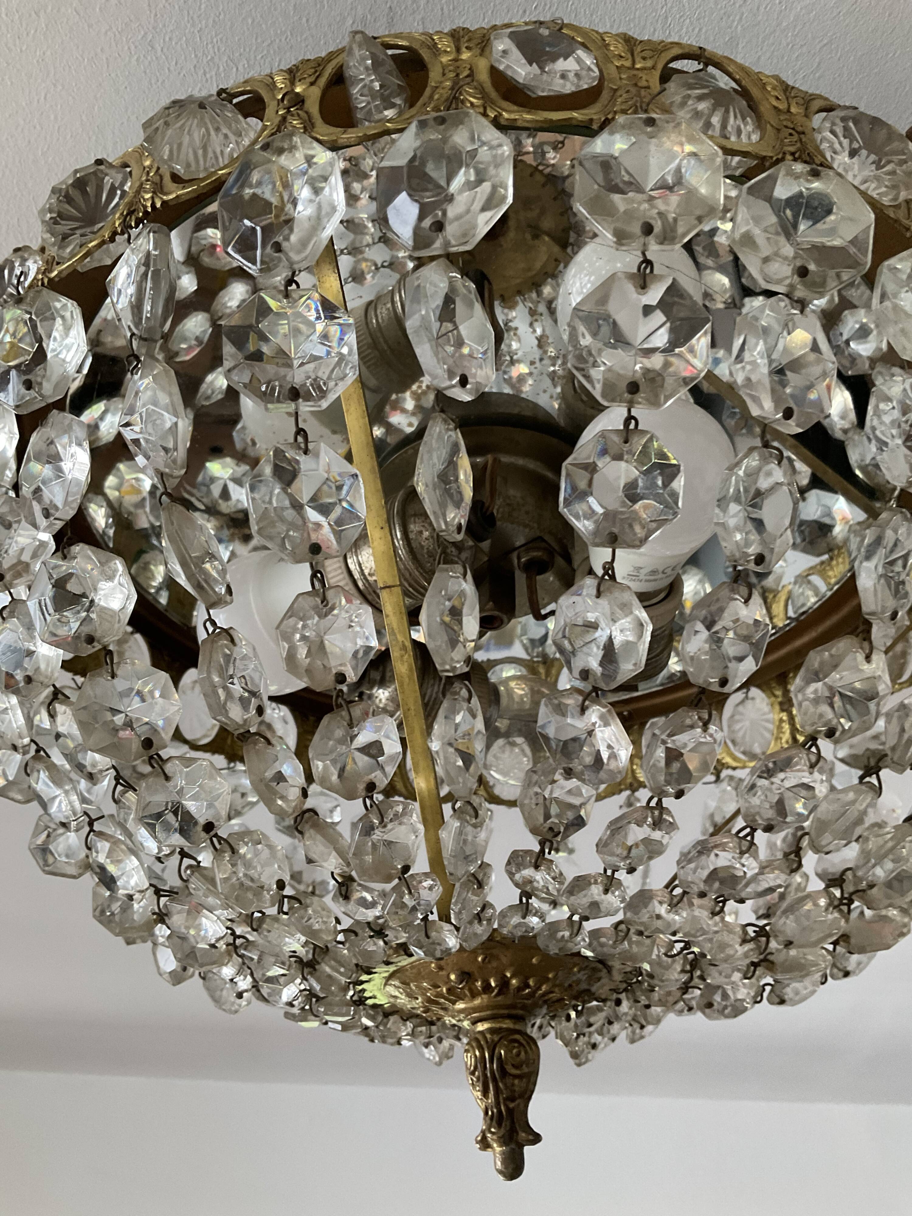 Old ceiling lamp basket in bronze and grapevines