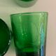 6 green whiskey glasses, bubbles and Biot soufflés