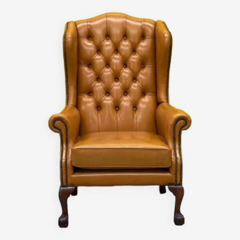 English leather buttoned back wing armchair