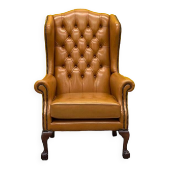 English leather buttoned back wing armchair