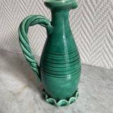 Small green ceramic pitcher