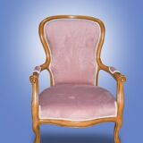 Fauteuil rose en bois