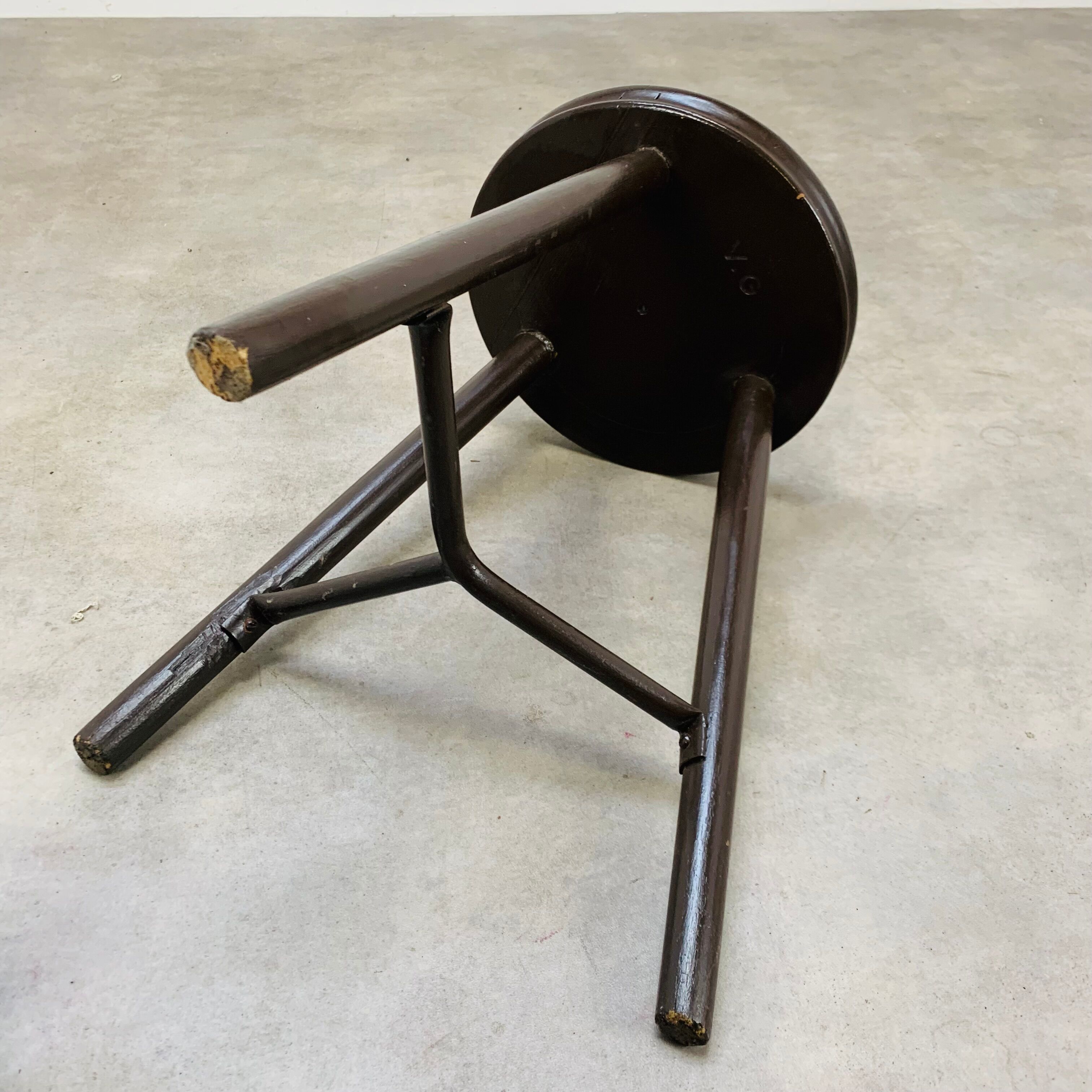 Industrial metal and wood tripod stool