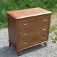 Vintage oak commode with tapered legs from the 1950s.