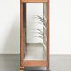 Large antique display cabinet made of oak and equipped with shelves