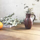 Brick red jug