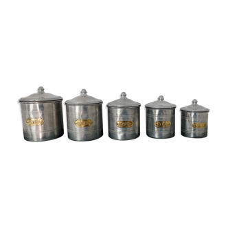 Series of 5 tin spice pots