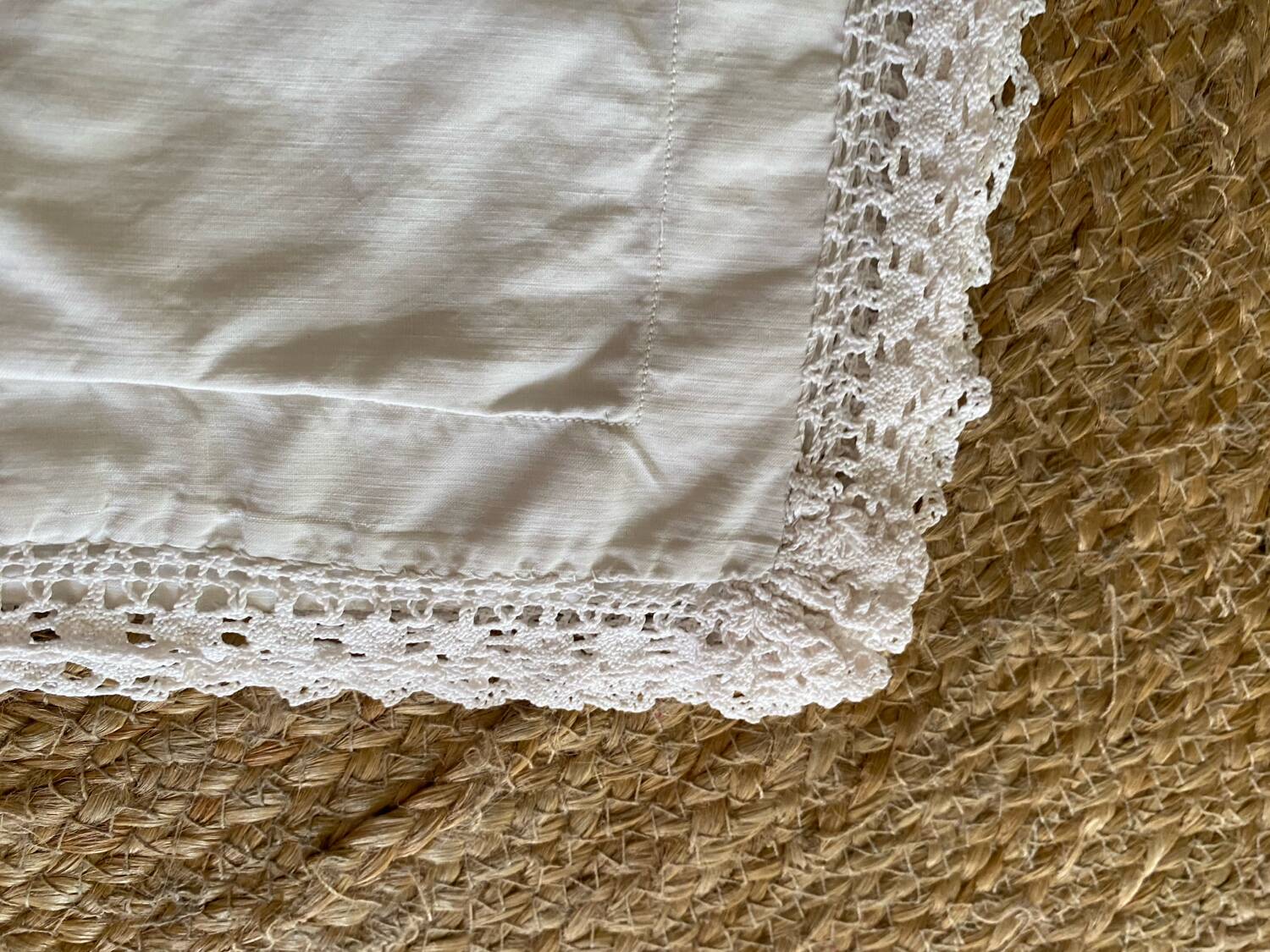 Old cotton and lace pillowcase.