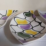 Three vintage free-form ceramic ravine dishes from the 1950s