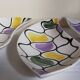 Three vintage free-form ceramic ravine dishes from the 1950s