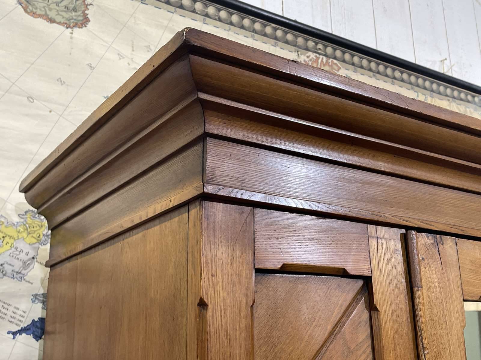 English oak wardrobe from the early 20th century.
