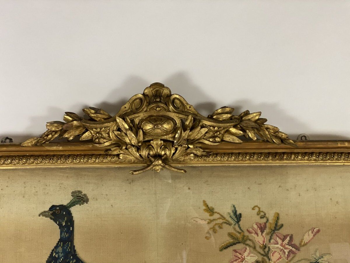 Cross-stitch tapestry in a Louis XVI style frame from around 1900.