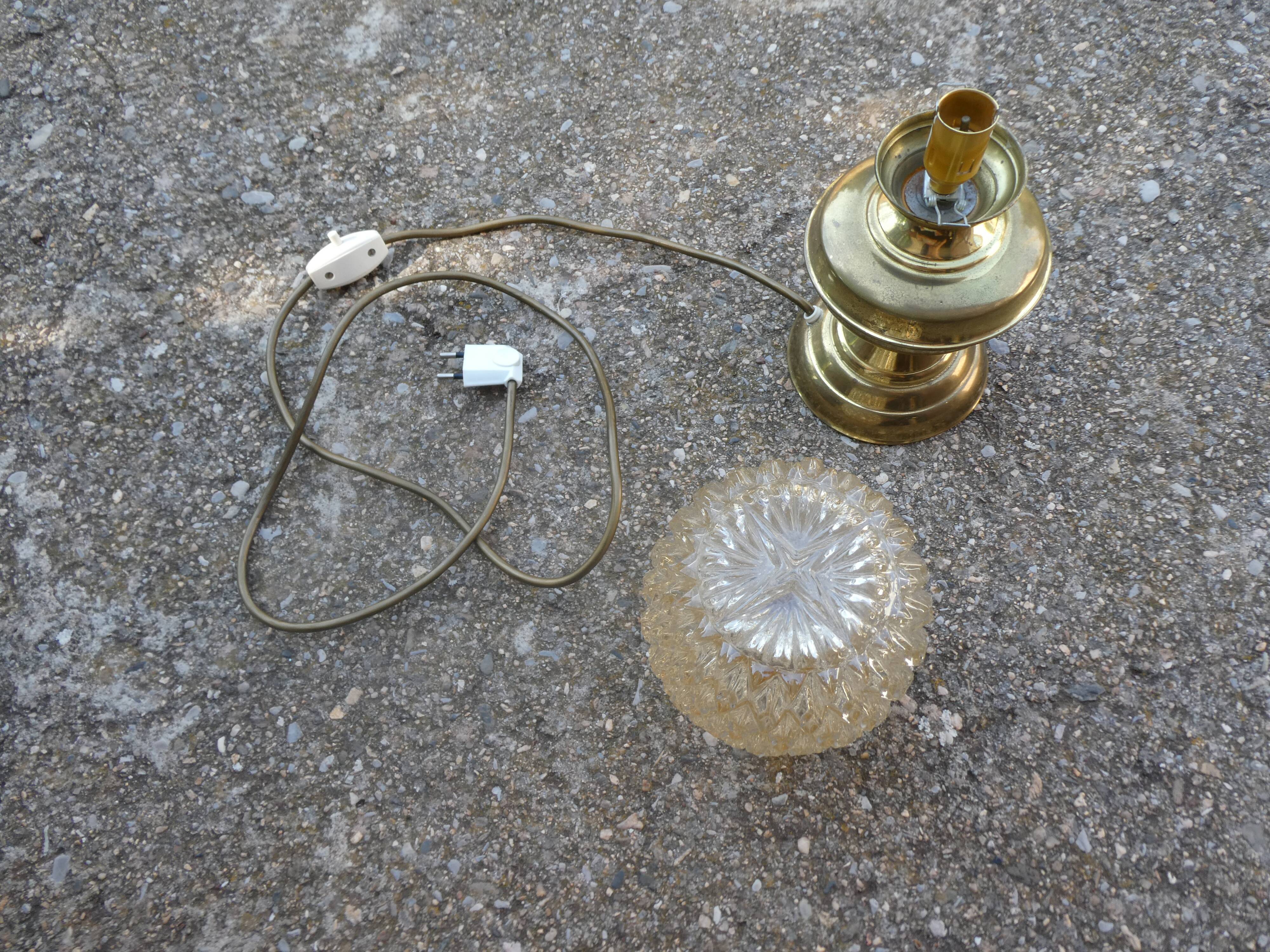 Vintage table lamp with chiseled glass globe.