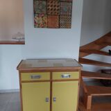 Vintage wooden buffet with a marble top.