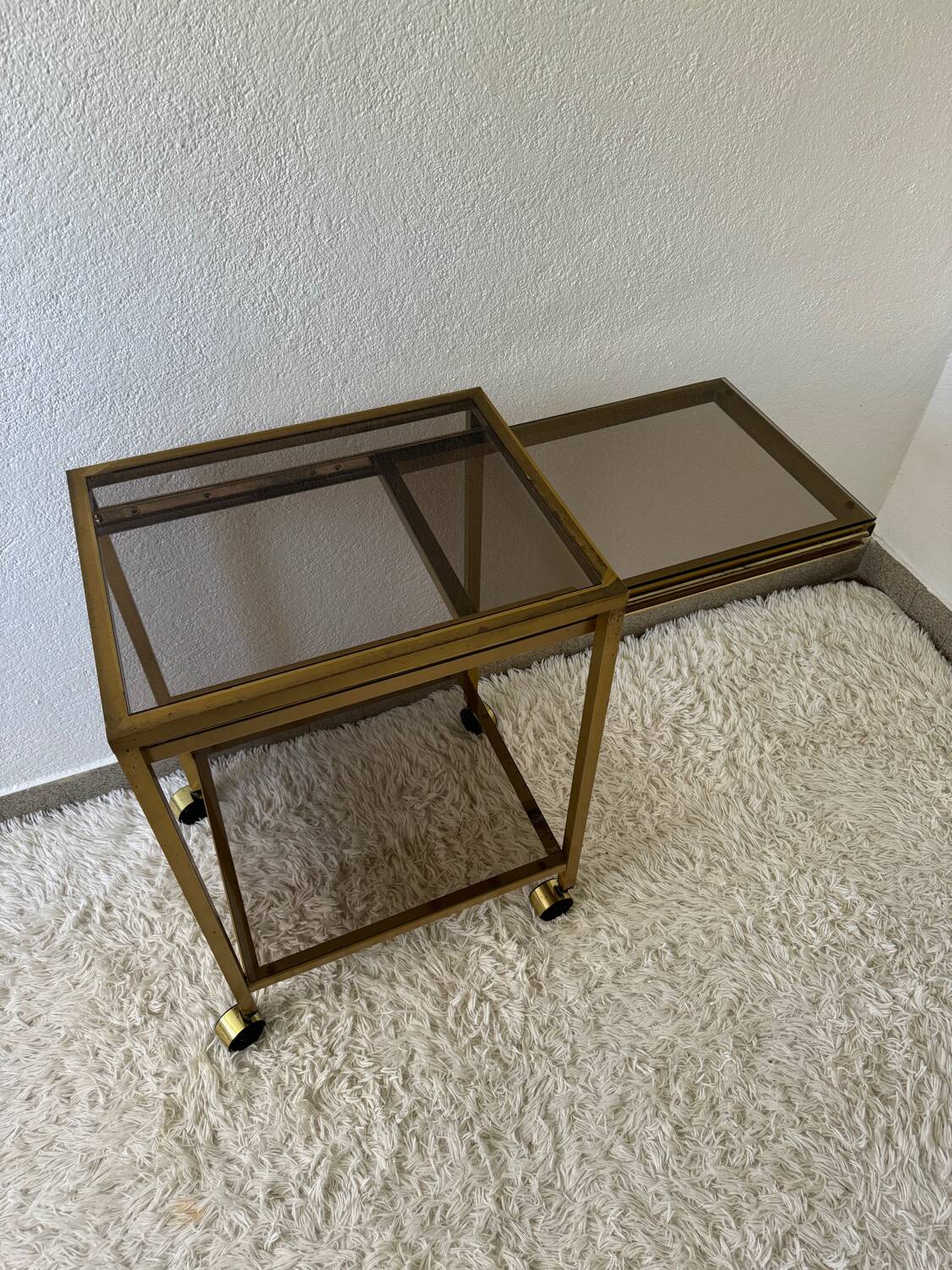 Brass rolling trolley with smoked glass from the 70s