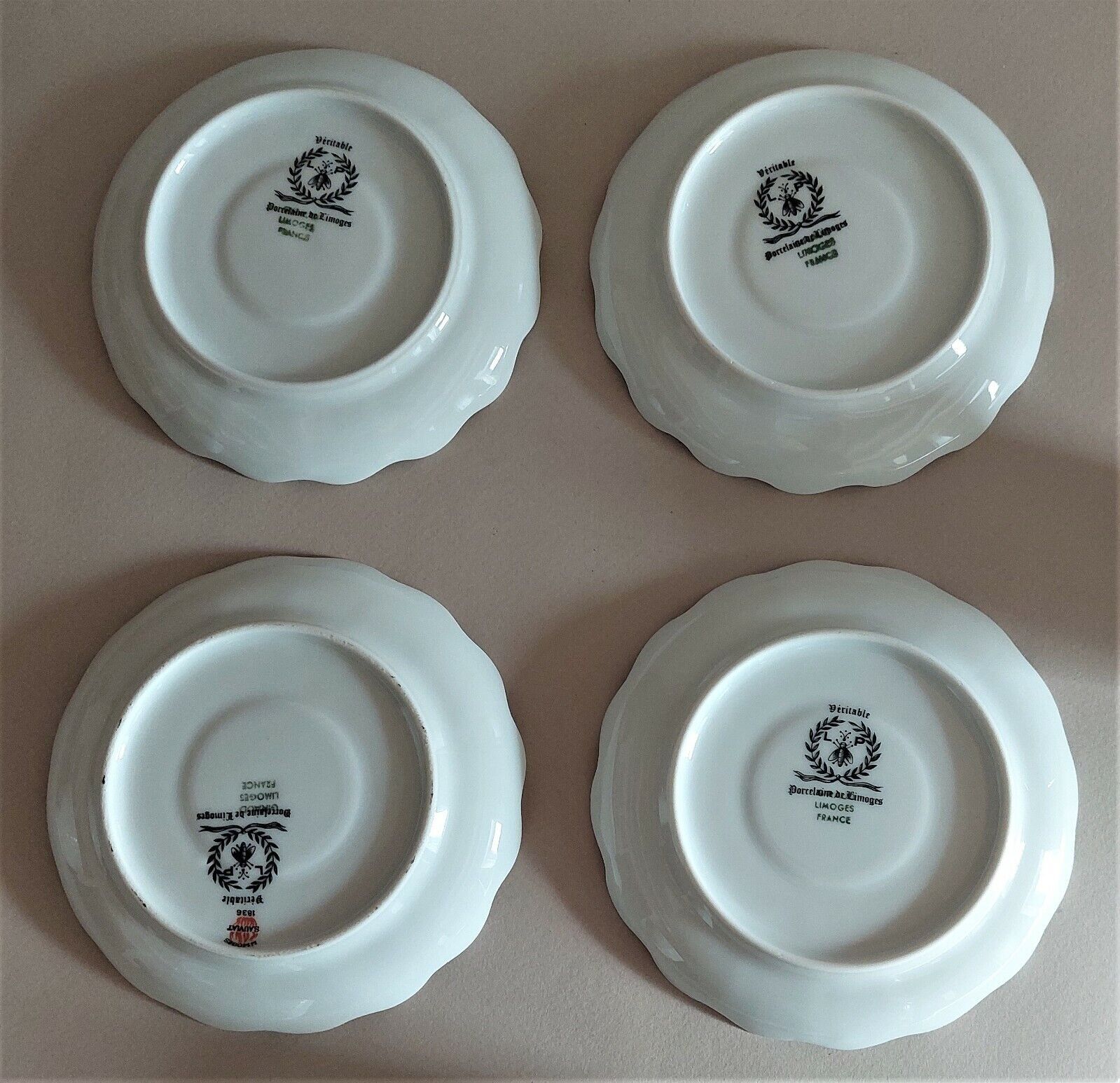 Tasses série de quatre porcelaine de Limoges Giraud
