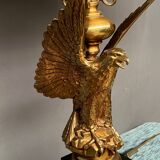 Large lamp with a bronze eagle figure.