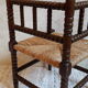 Fauteuil de coin paillé