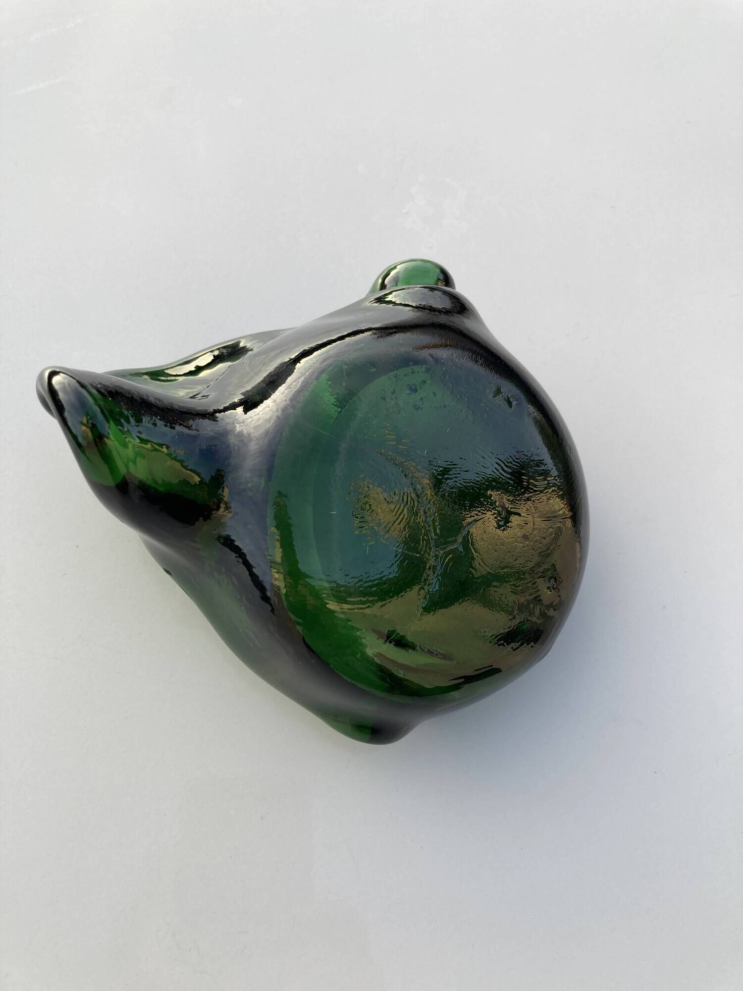 Sculptural ashtray in emerald green glass