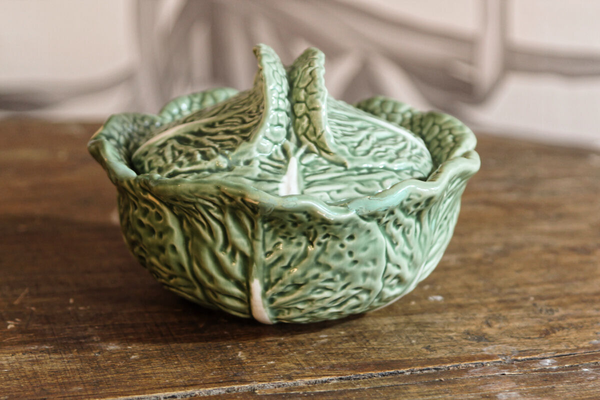 Covered pot in slip, collard greens