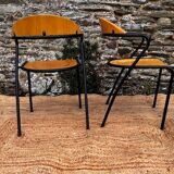 Pair of wooden and black metal chairs