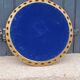 Round neoclassical style mirror in wood and gilded stucco from the 1950s