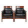 Set of 2 black leather Art Deco design armchairs in good condition