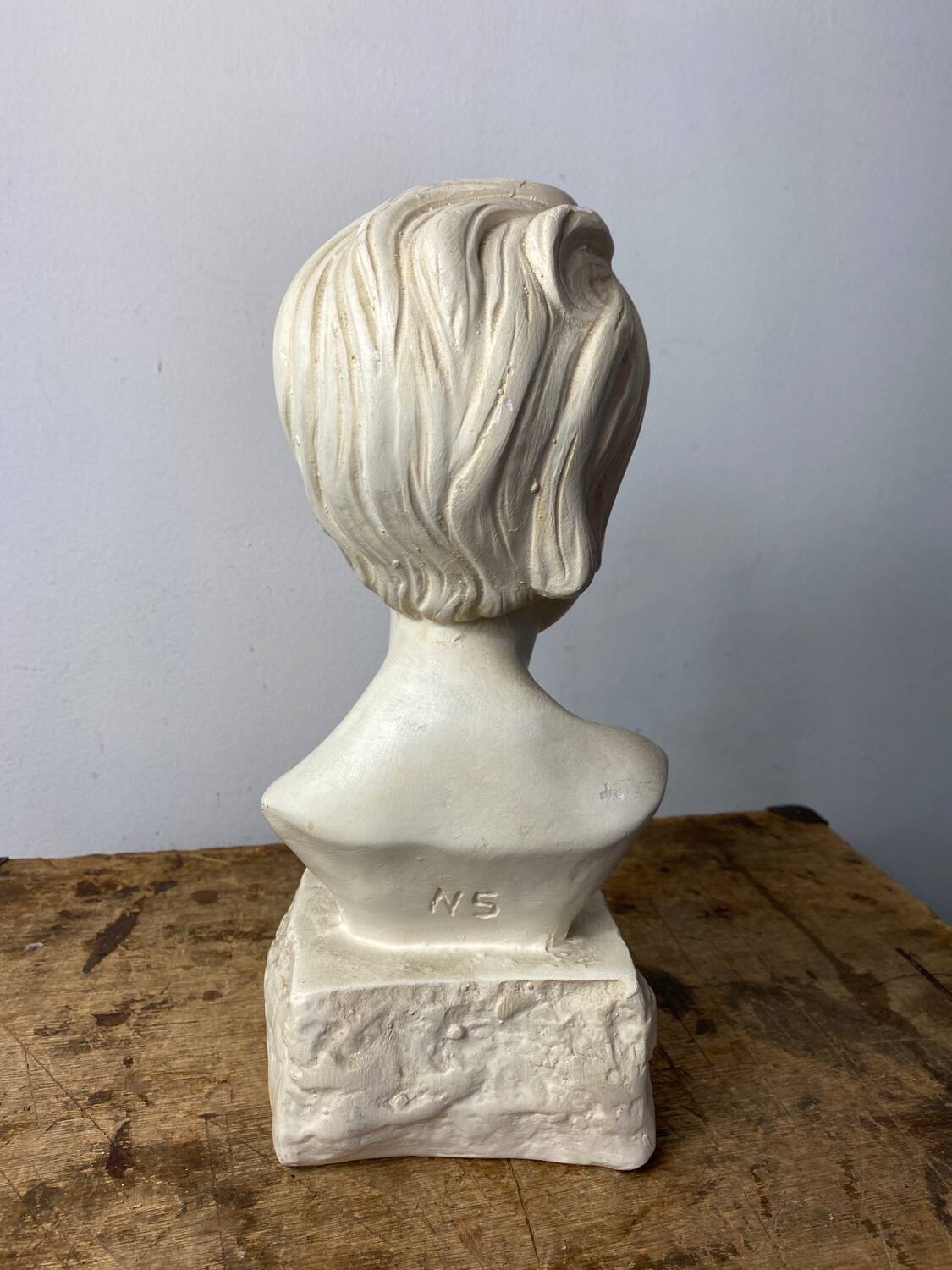 Plaster bust of a young girl