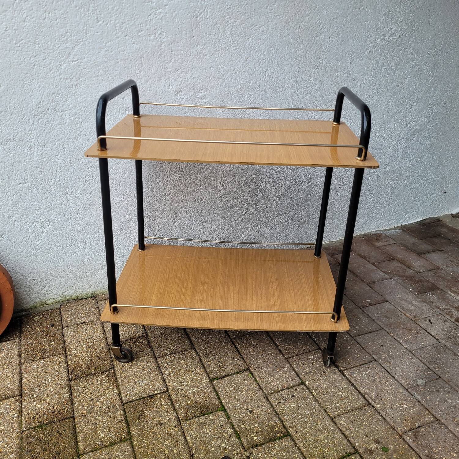 Rolling dessert trolley in formica – black tubular structure, 1960s.