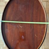Table basse ovale en placage d’acajou