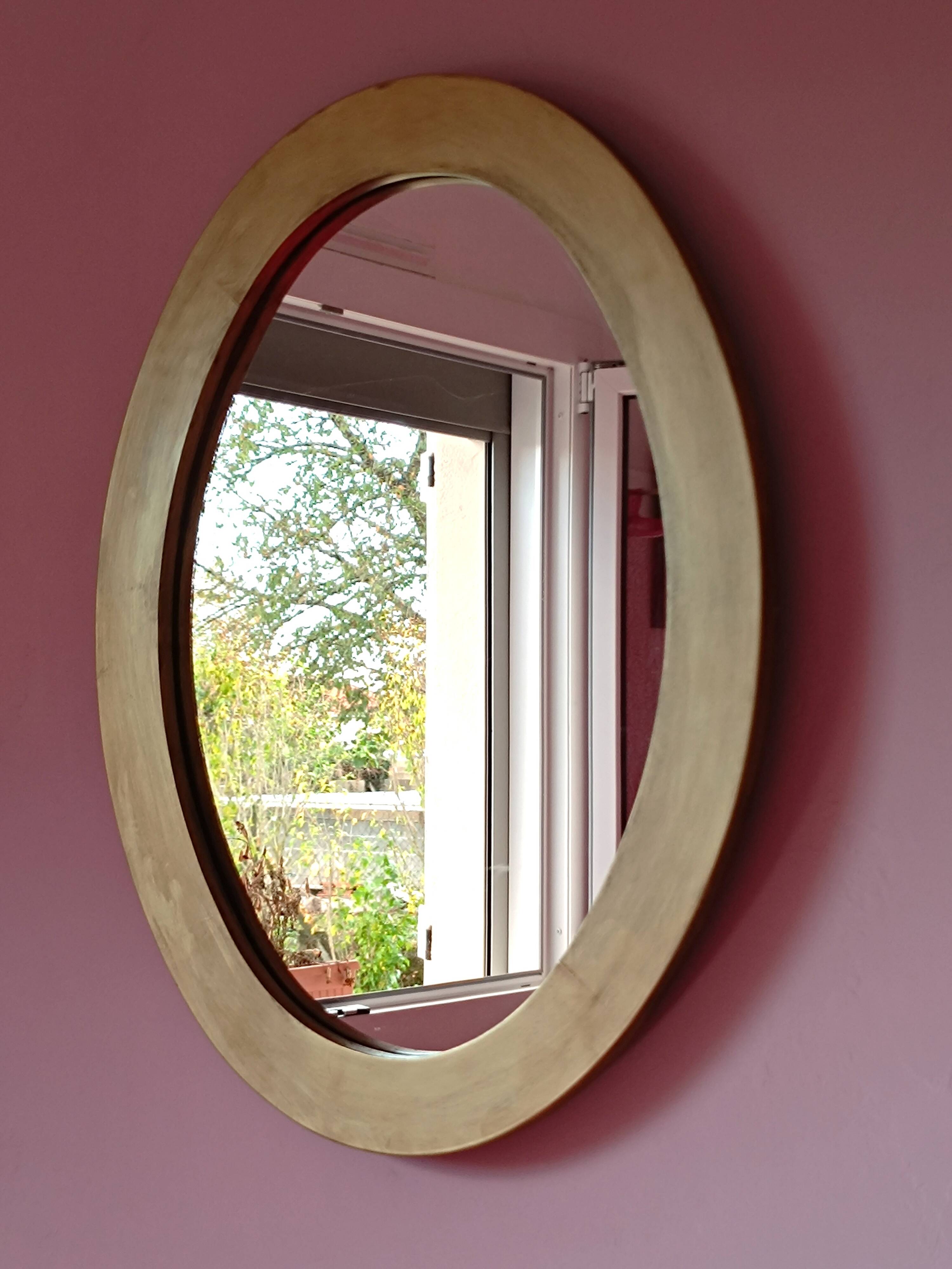 Miroir ovale en bois doré