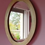 Miroir ovale en bois doré