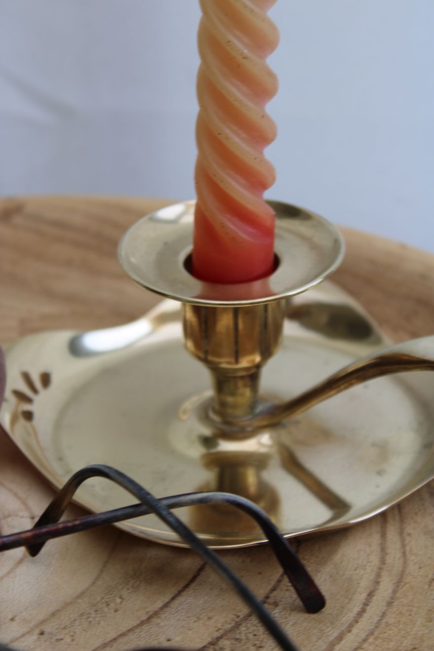 Golden brass candle holder